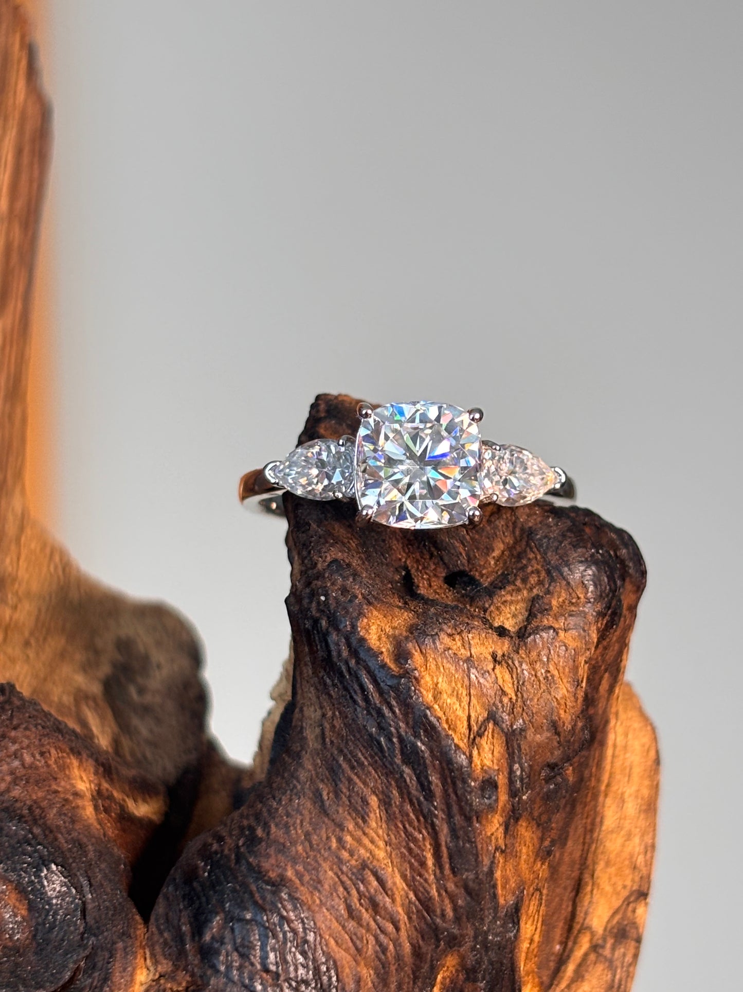 Moissanite Cushion Center Ring with Pear Side Stones