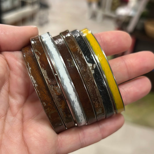 Leather-lined metal bracelets