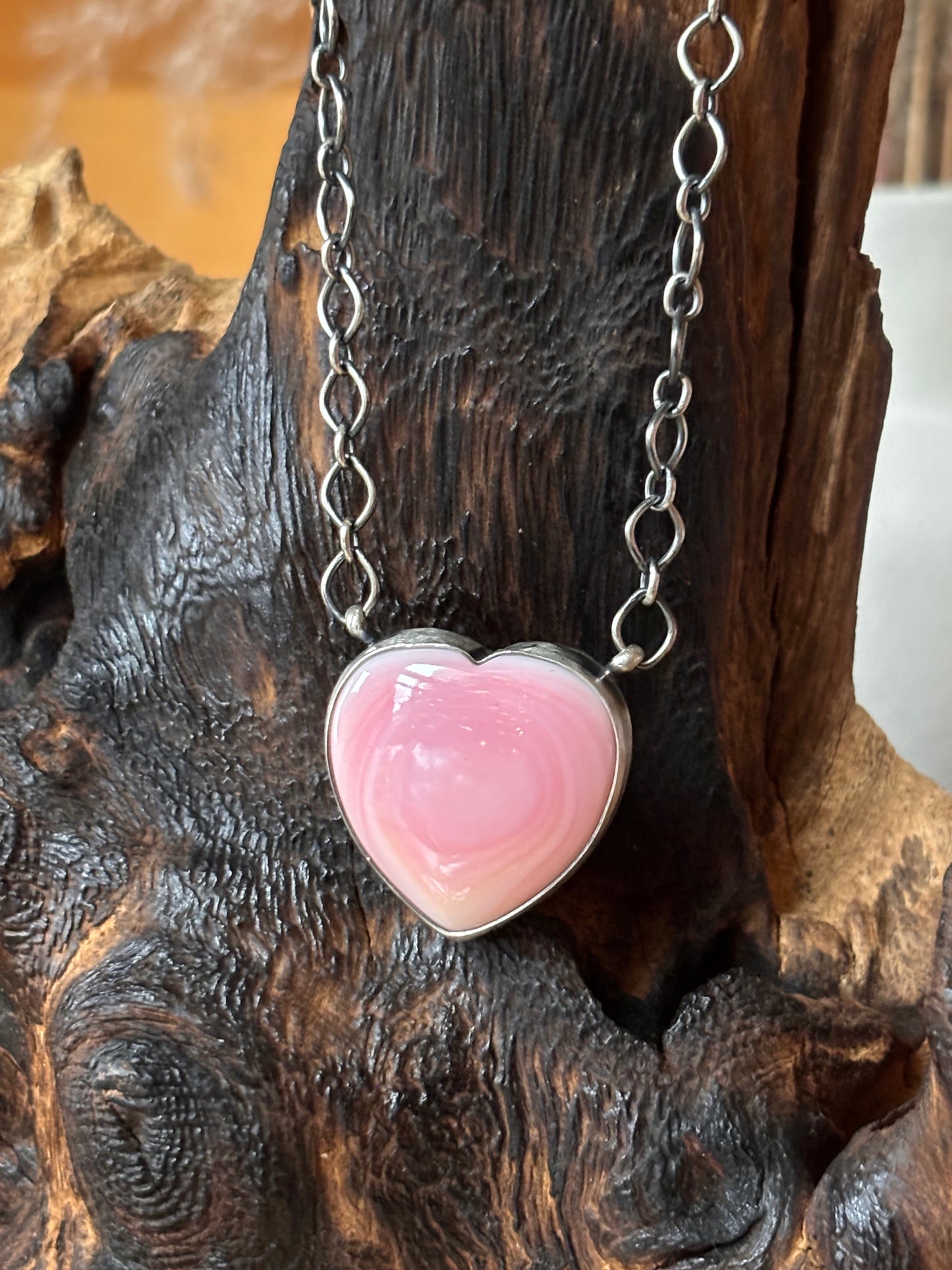 Navajo Pink Conch Heart Necklace made by Donavan Skeets