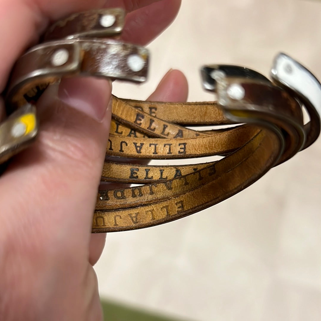 Leather-lined metal bracelets