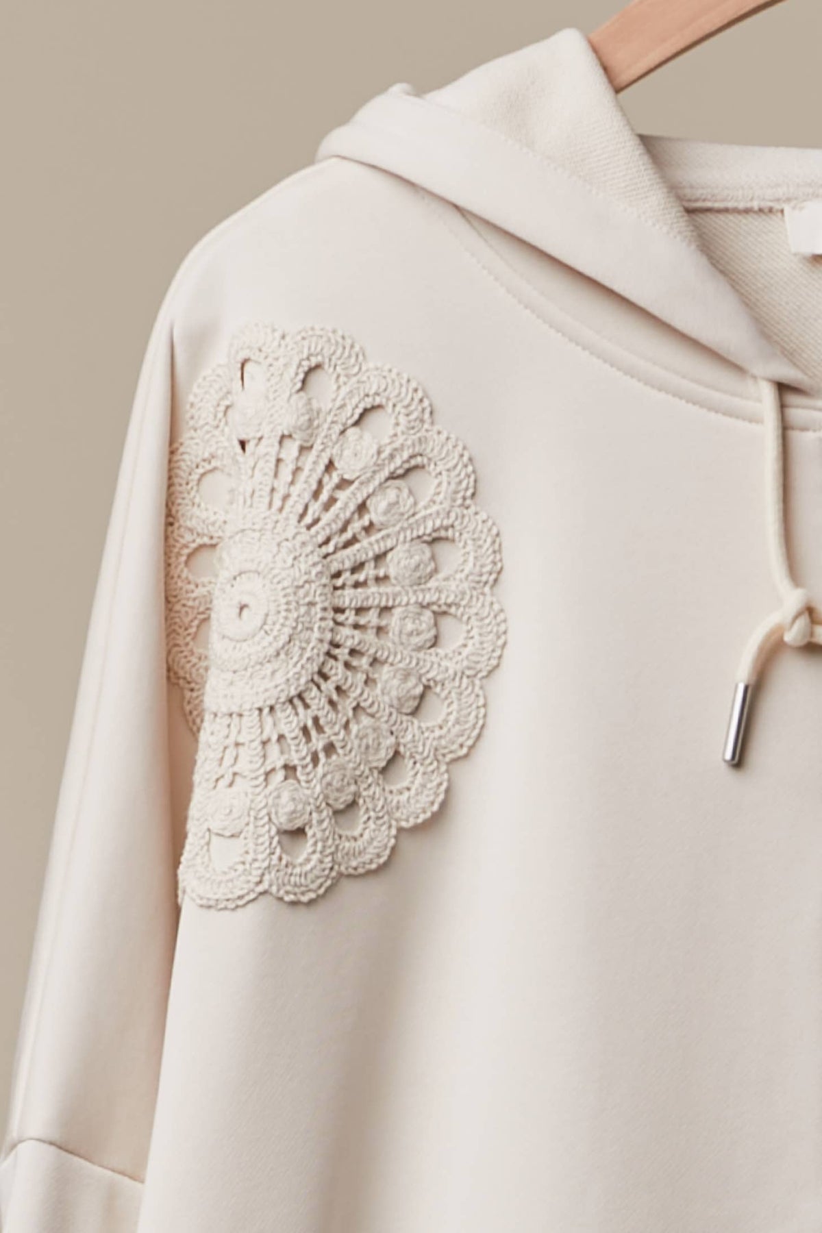 Chic Lace Trimmed Hoodie with Crochet Accents